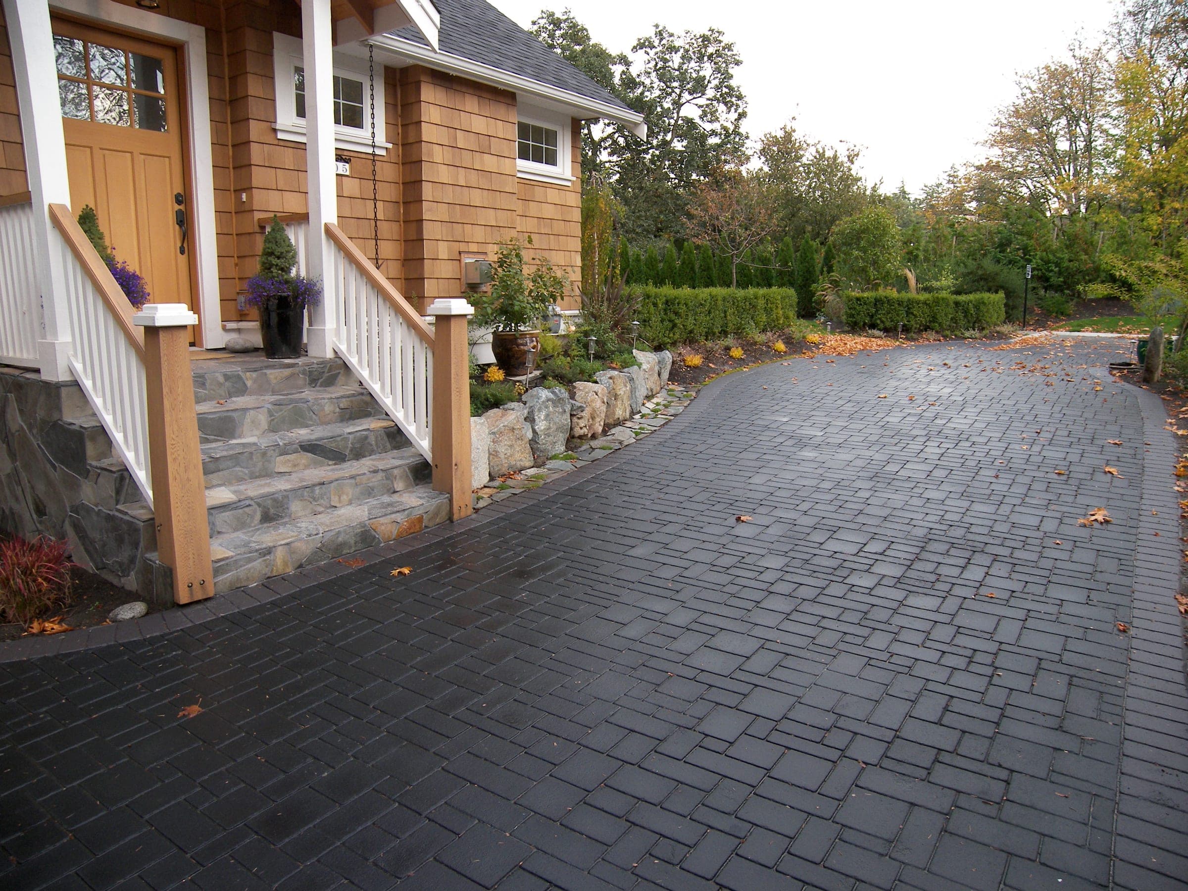 Charcoal cobble StreetPrint driveway installed by Square One