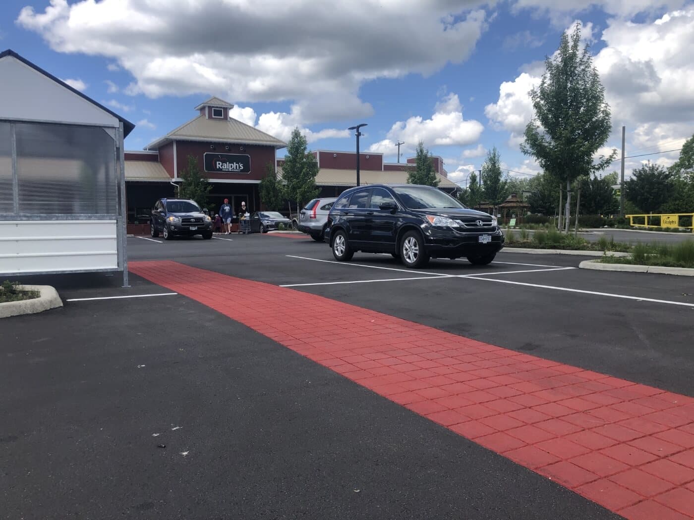 Red brick StreetPrint walkway across the parking lot at Ralph's Farm Market, Langley