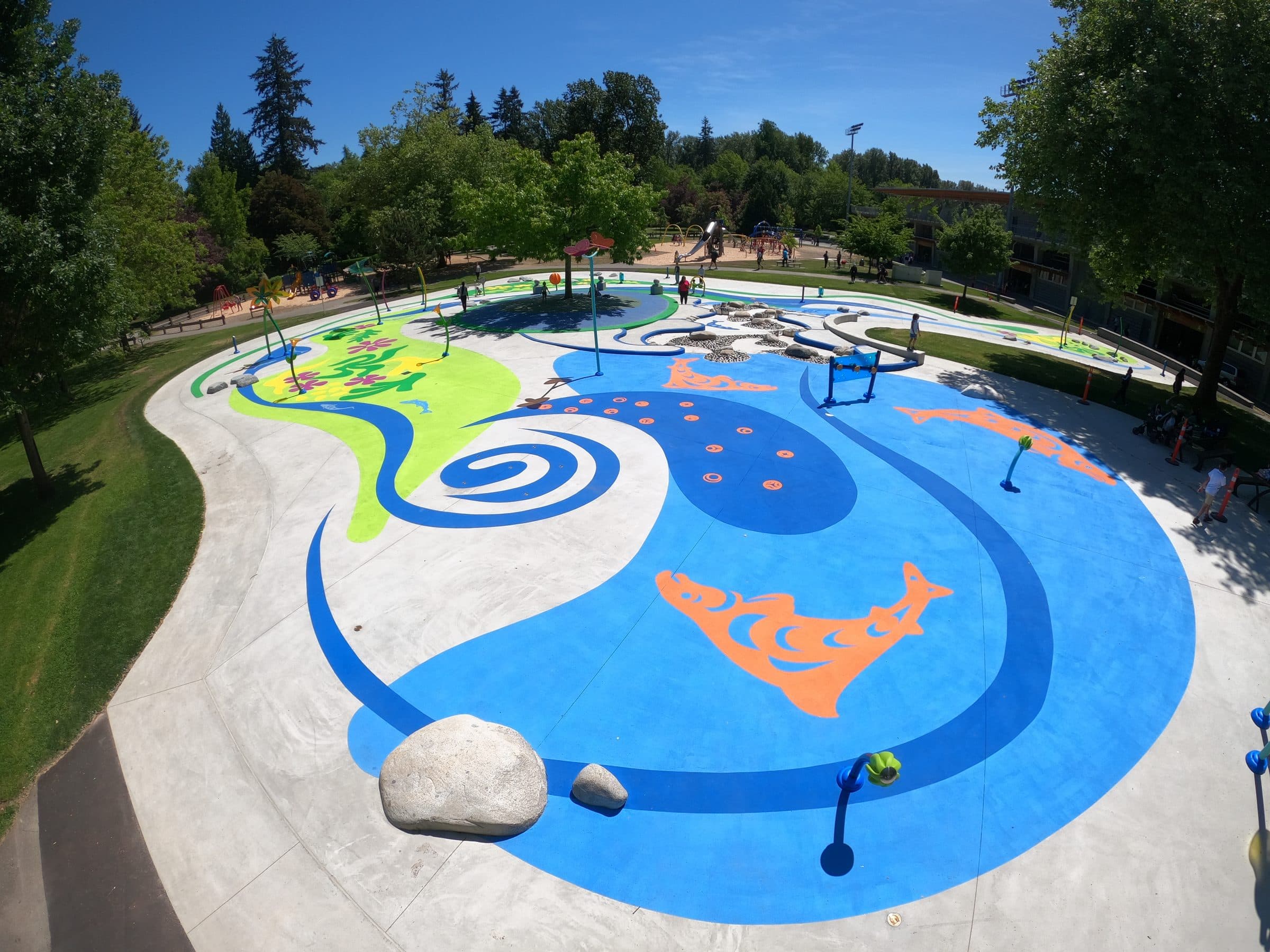 A blue StreetBond swirl and sea creatures across the Marine spray park in Surrey
