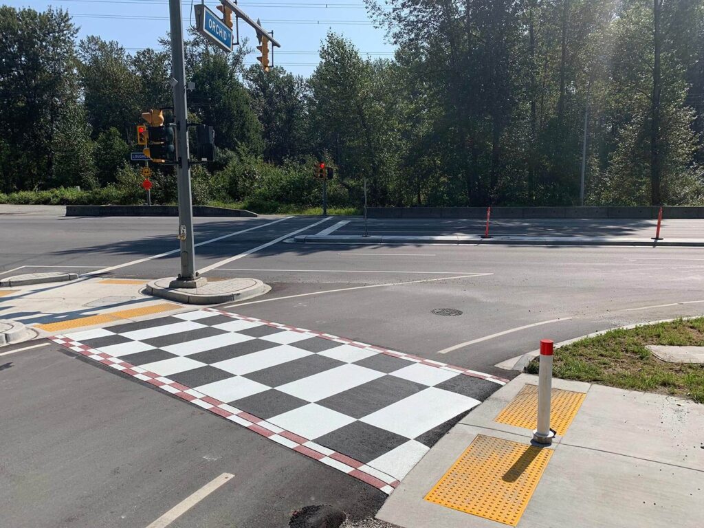 TrafficPatterns checkerboard crosswalk asphalt installation